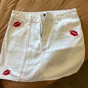 Forever 21 white skirt with red kisses. Perfect condition. Worn one time.